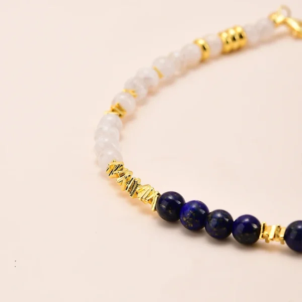 Close-up view of lapis lazuli and snow phantom crystal beads on the bracelet