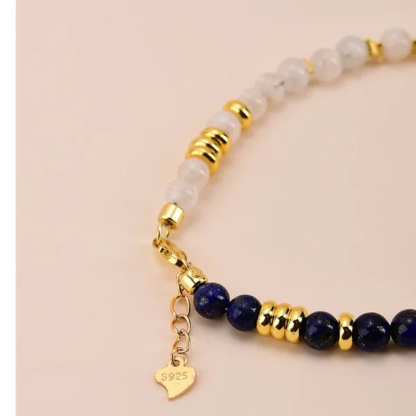 Close-up of Snow Phantom Quartz beads with gold-plated silver spacers