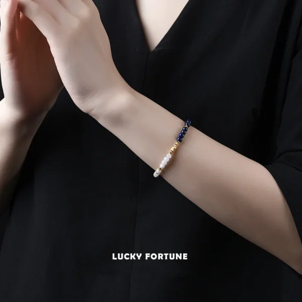 Model wearing Lapis and Snow Phantom energy bracelet