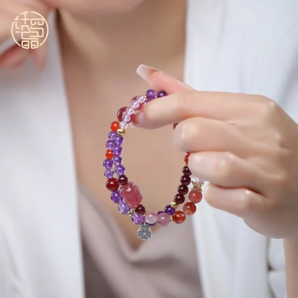 Double wrap fire energy bracelet worn on wrist