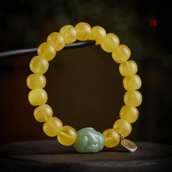 Beeswax Amber Feng Shui bracelet with zodiac guardian charm for spiritual protection