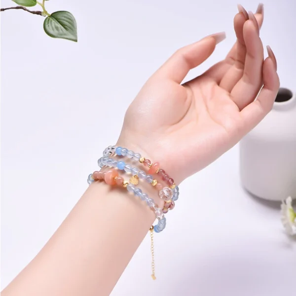 Model wearing Brave Bloom wrap as multi-layer bracelet