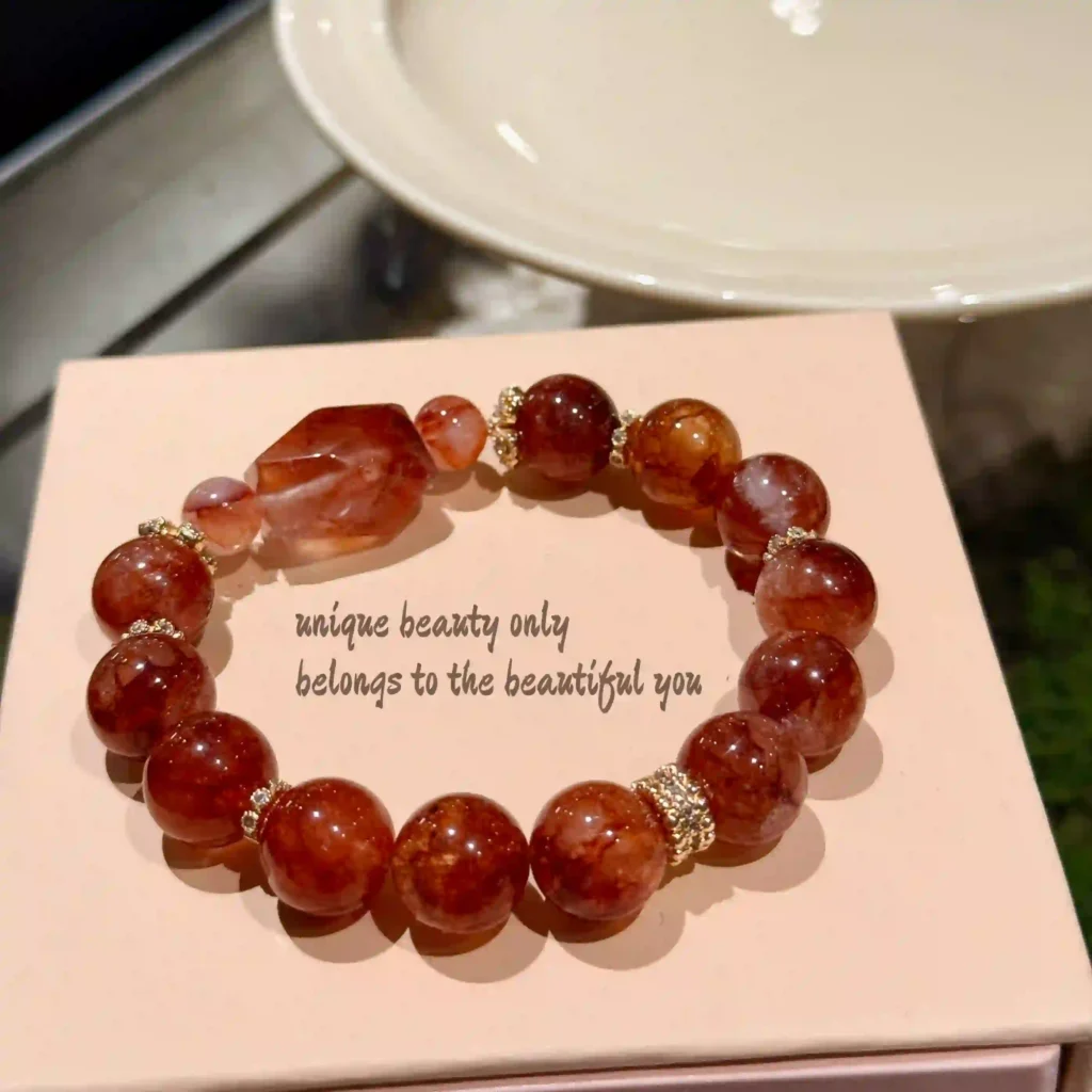 Red flower agate bracelet on gift box, symbolizing elegance and uniqueness