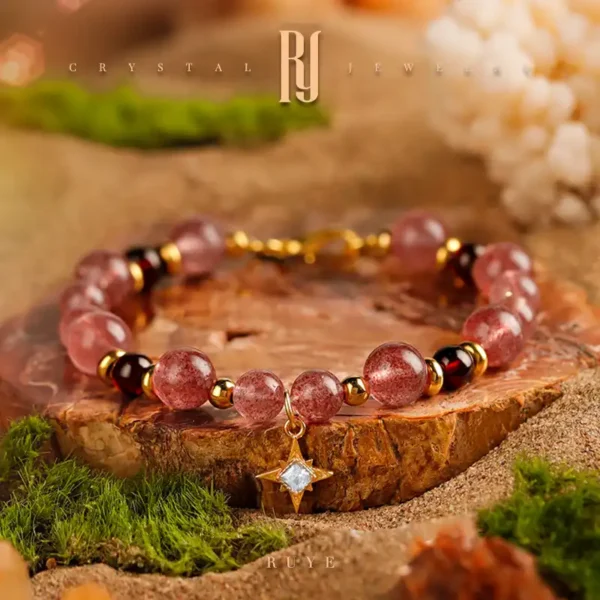 Strawberry quartz and garnet crystal bracelet with gold accents and star zircon charm