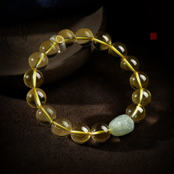 Yellow Citrine bracelet with carved Hetian Jade centerpiece for Feng Shui protection