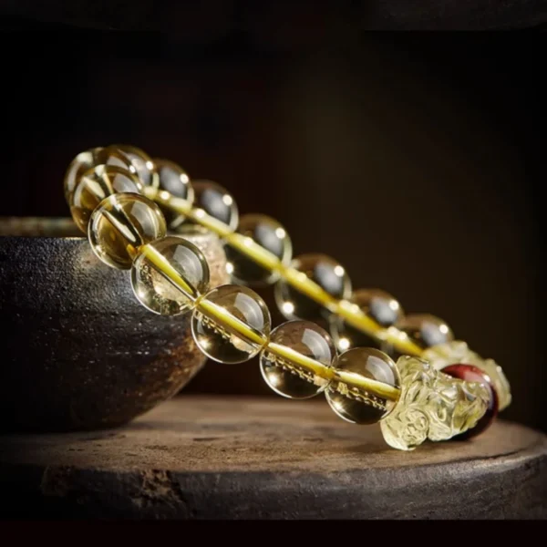 Citrine Feng Shui bracelet with PiXiu charms and Tiger’s Eye centerpiece for energy balance