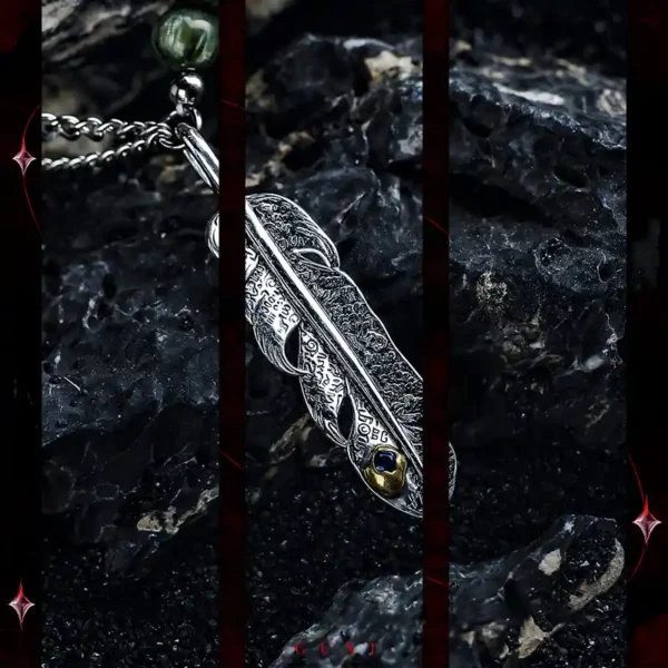 Engraved silver feather pendant close-up with brass eye detail
