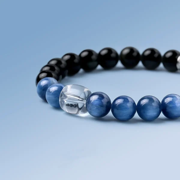 Close-up of clear quartz and kyanite beads on Guardian Realm bracelet