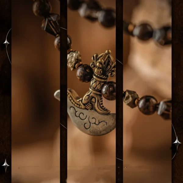 Close-up of the brass axe pendant on the Asura God necklace