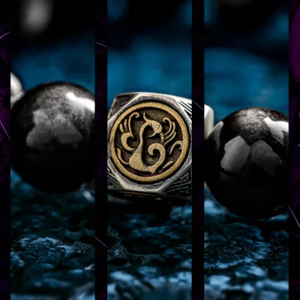 Close-up of Four Divine Beasts engraved on silver bead