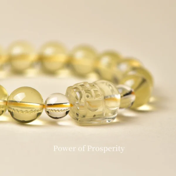 Close-up of Citrine Pixiu Beads with Glossy Finish