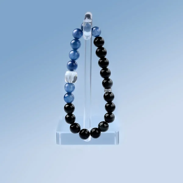 Guardian Realm bracelet displayed vertically on transparent stand