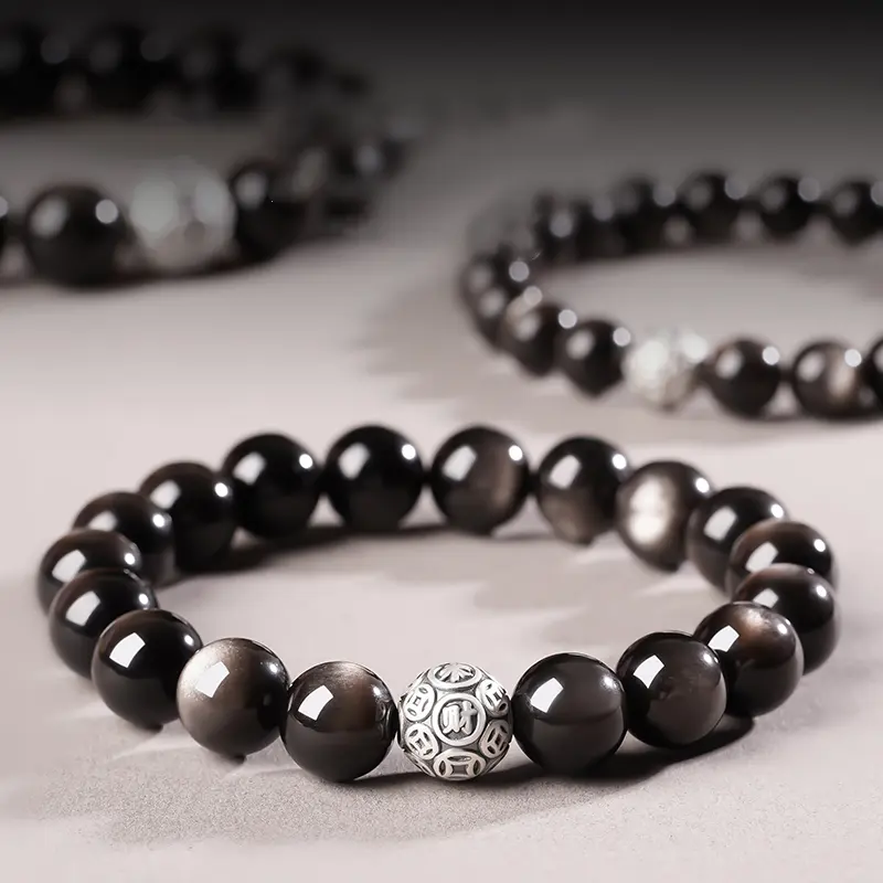 Silver Obsidian bracelet with engraved silver fortune bead