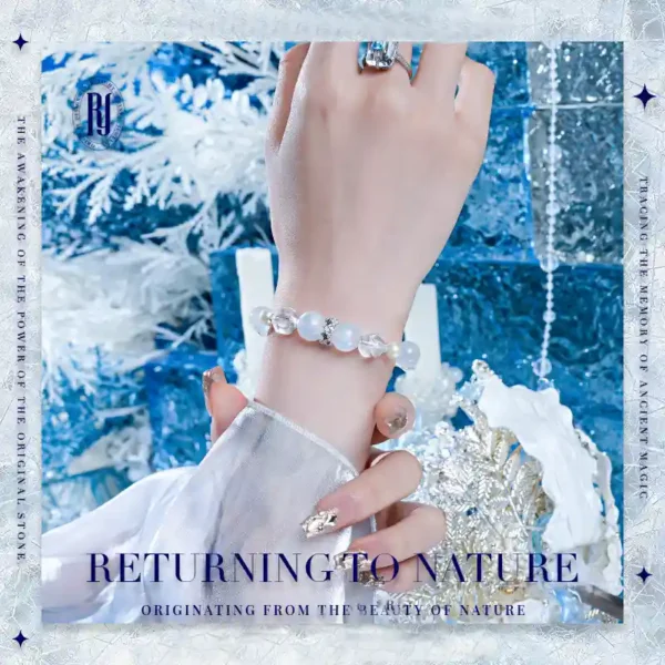 Model wearing elegant RUYE moonstone and white crystal bracelet with pearls and 925 silver for women