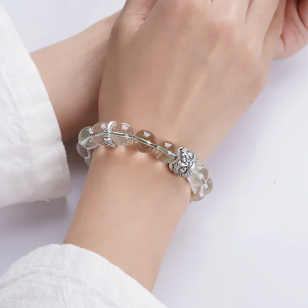 Close-up of lucky energy bracelet on wrist