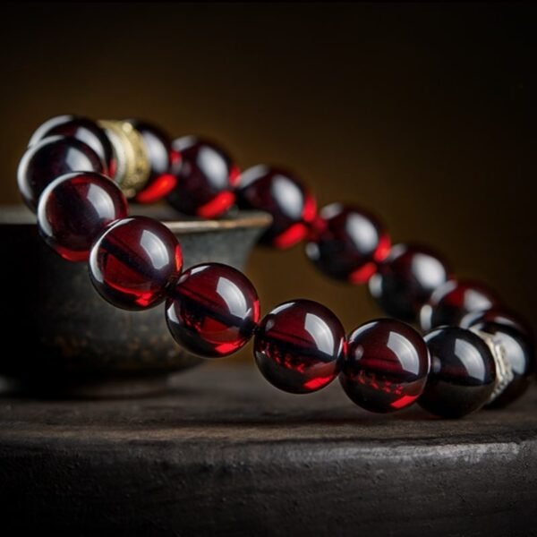Close-up of Blood Amber Feng Shui Protection Bracelet