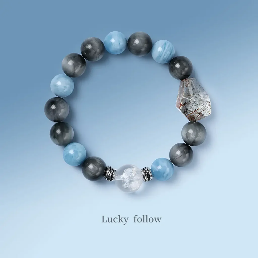 Courage energy bracelet featuring Aquamarine and Black Gold Super Seven