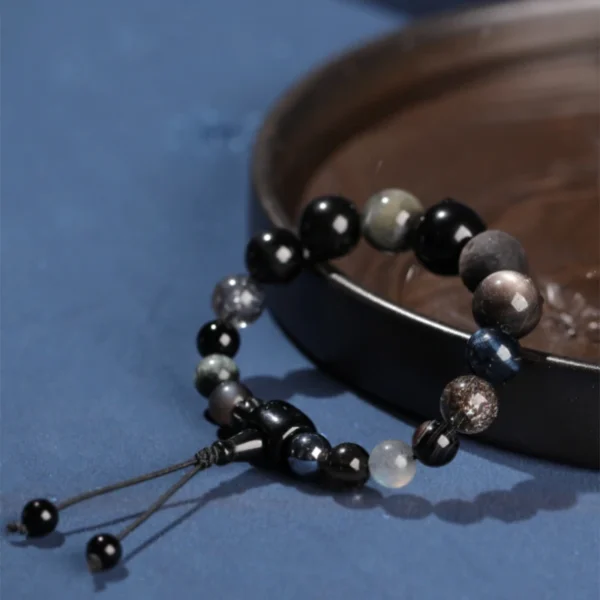 Obsidian and Black Rutilated Quartz close-up