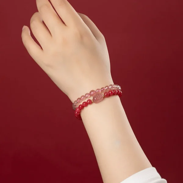 Hand flipping pages with love bracelets – daily wear harmony