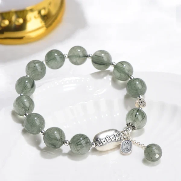 Green Rutilated Quartz lucky bracelet with silver Fu charm