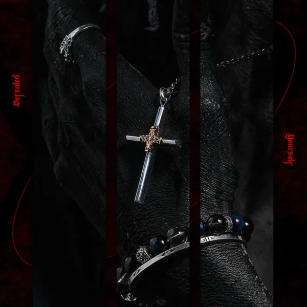 Gothic cross necklace worn by model with dark styling