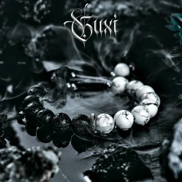 GUXI black and white volcanic stone men's energy bracelet poses