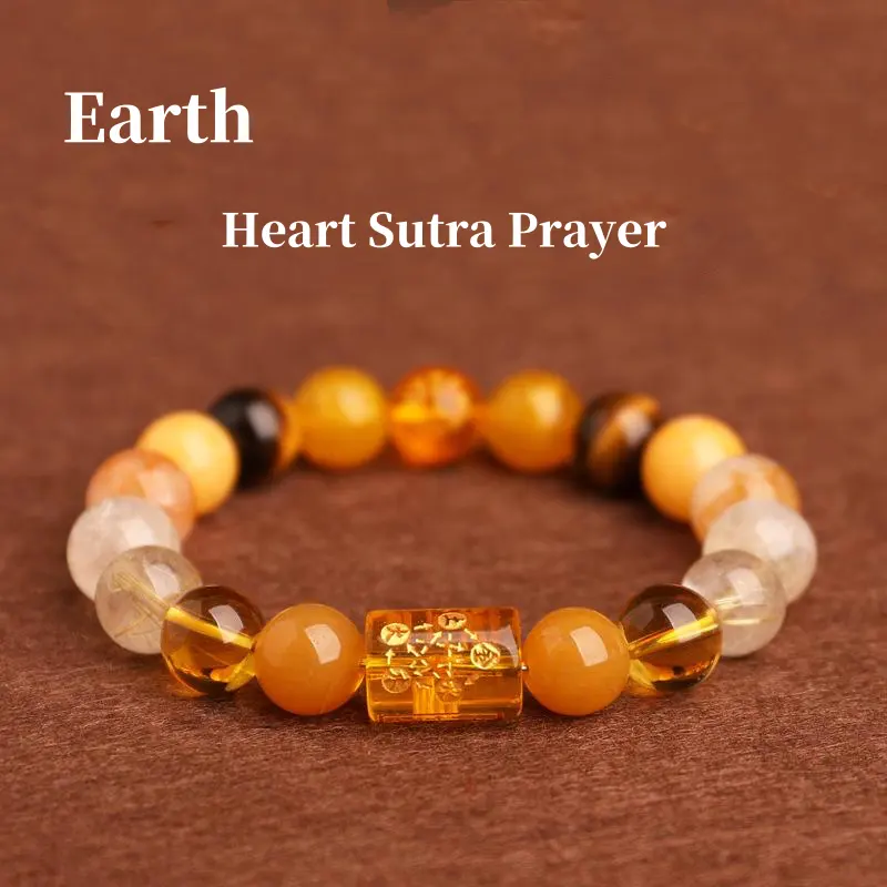 Golden Earth yellow crystal Feng Shui bracelet with carved Heart Sutra