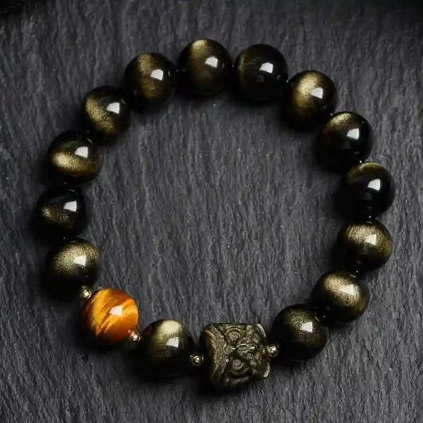 Golden sheen obsidian bracelet with lion head and tiger eye bead