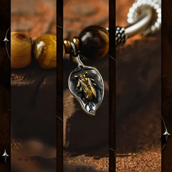 Close-up of insect leaf charm on tiger eye and wood bead bracelet