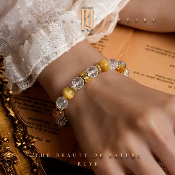 Crystal bracelet with Anderson stone and clear quartz worn on wrist