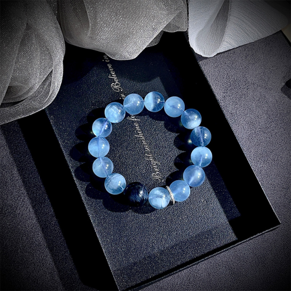 Aquamarine and blue tiger eye bracelet with crystal ring on black box