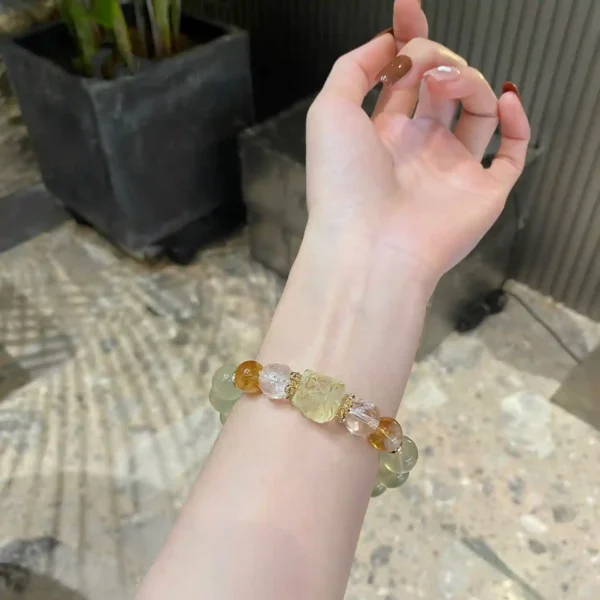 Feng Shui bracelet with lion bead shown on inner wrist