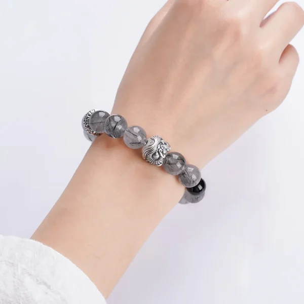 Courage crystal bracelet on model’s hand