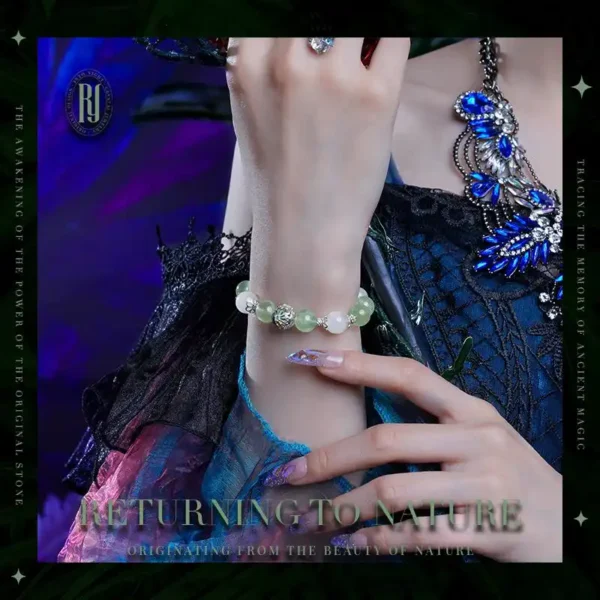 Woman wearing RUYE handmade White Ghost and Prehnite crystal bracelet
