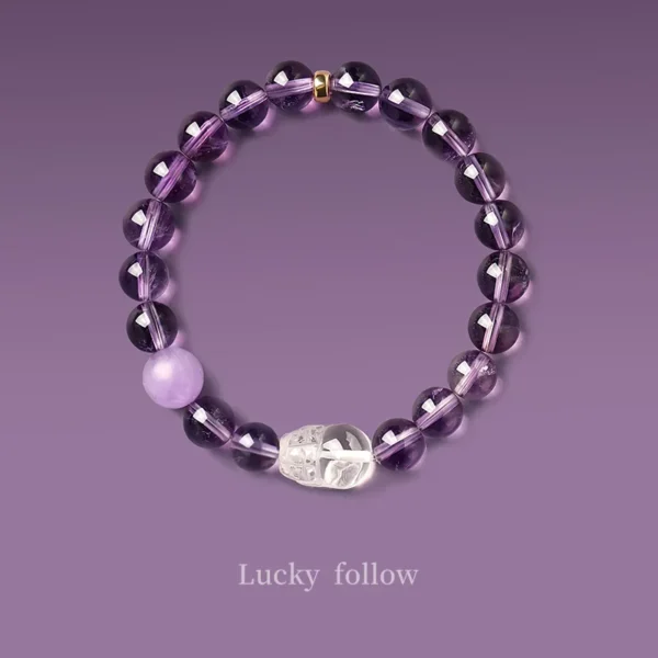 Top view of amethyst crystal bracelet with Pixiu and lavender bead