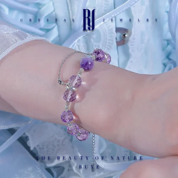 Faceted amethyst and purple jade crystal bracelet resting on wrist – spiritual jewelry