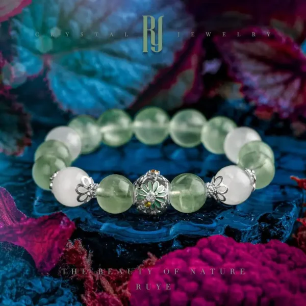 Front view of RUYE White Ghost and Prehnite crystal bracelet with floral silver accents