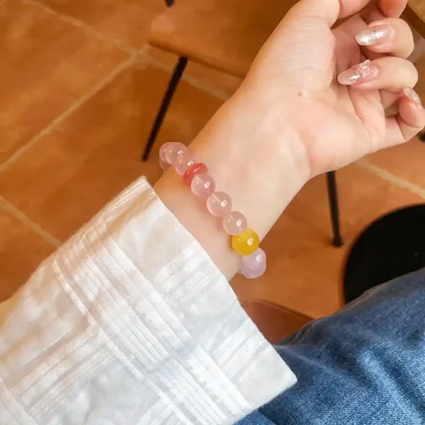 Crystal bracelet hanging mid-air with soft shadows