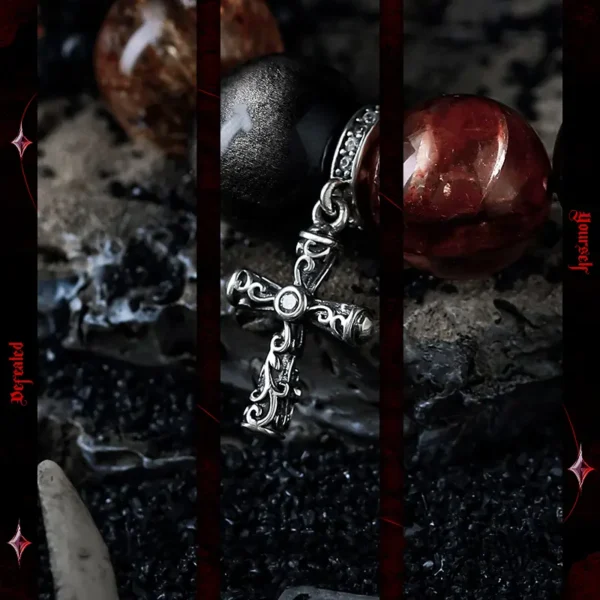 Close-up of silver cross charm on energy bracelet