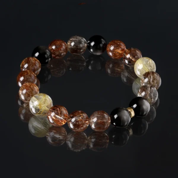 Fortune Align bracelet made with Super Seven and Golden Rutilated Quartz on black background