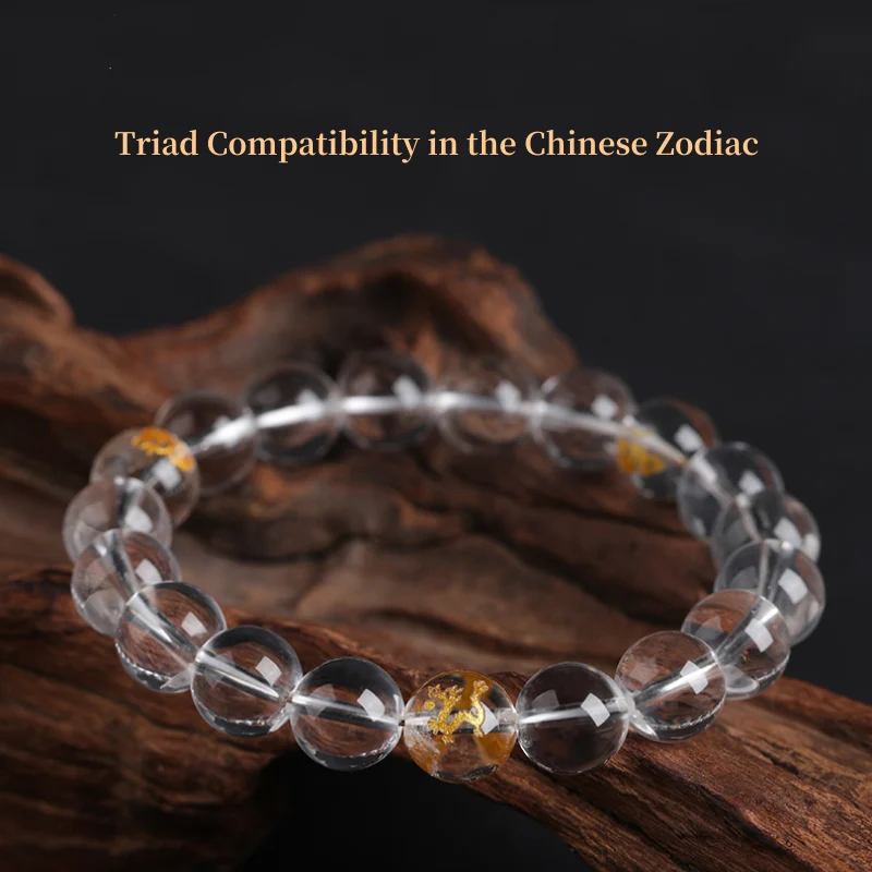 Clear quartz zodiac bracelet with engraved golden animal symbols representing Chinese zodiac trios
