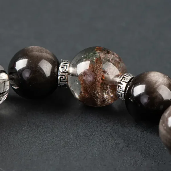 Crystal close-up of Black Rutilated Quartz and Seraphinite