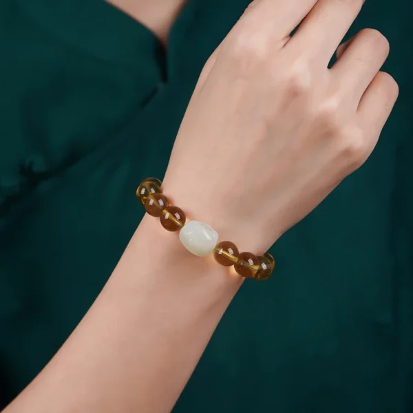 Wealth crystal bracelet worn on wrist – lifestyle image