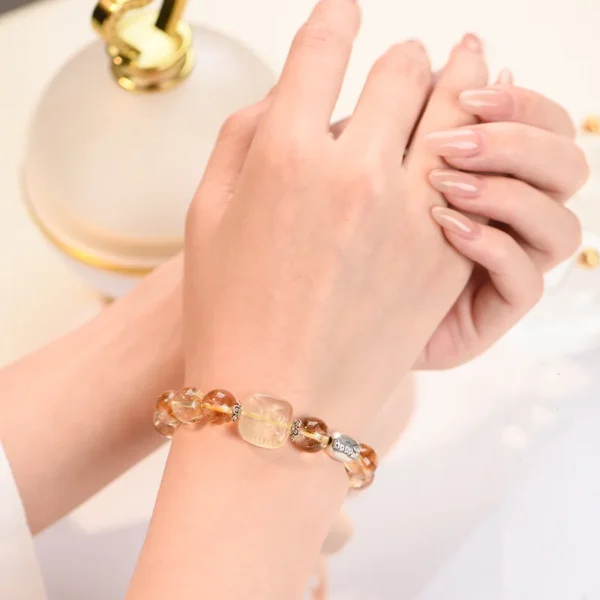 Double-Hand View of Citrine Pixiu and Tower Crystal Bracelet