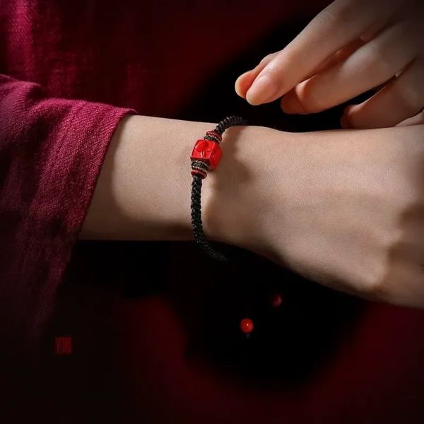 Model wearing rabbit cinnabar bracelet for zodiac energy alignment