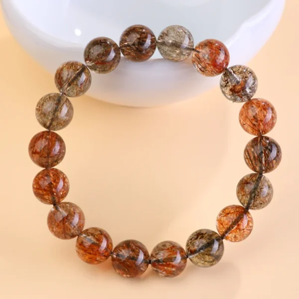 Top-down view of Black Gold Super Seven crystal bracelet