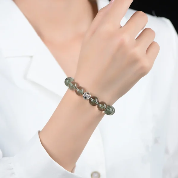 Woman wearing a lucky green phantom bracelet