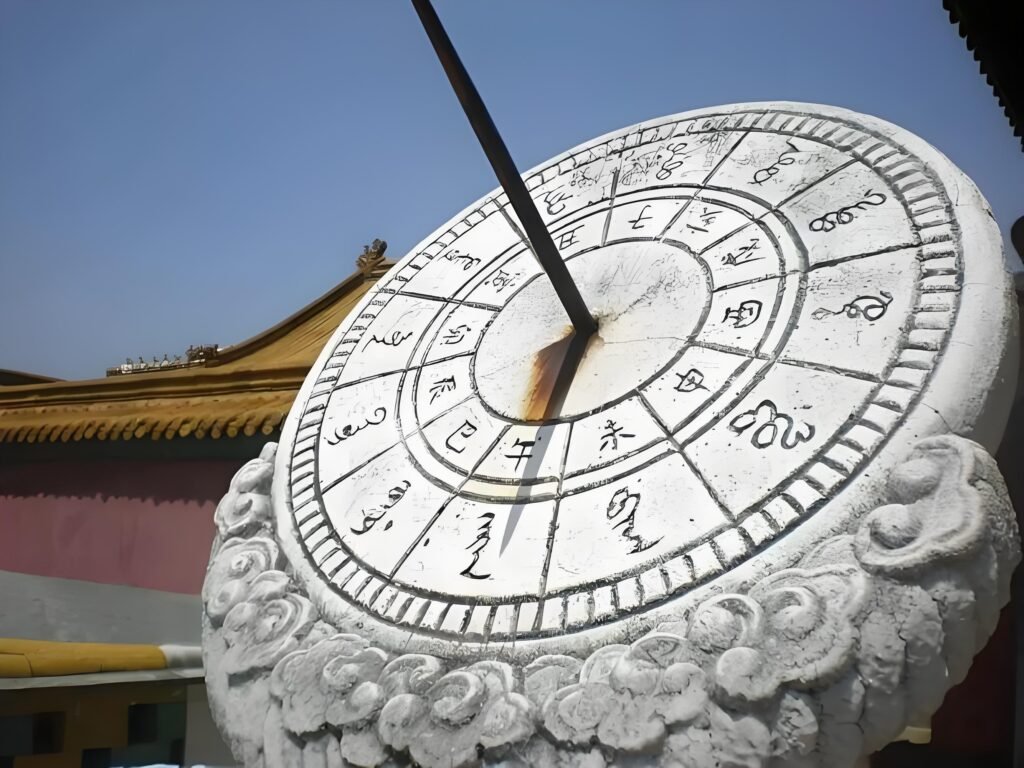 Ancient Chinese sundial—stone or bronze timekeeping instrument with central gnomon casting a shadow on marked dial to indicate time, reflecting traditional astronomical craftsmanship.